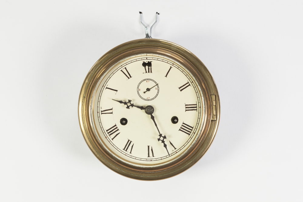 BRASS CASED BULKHEAD CLOCK, of typical form with subsidiary hours dial to the centre, numbered 0552/ - Image 2 of 2