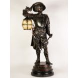 VICTORIAN PATINATED SPELTER 'DON CESAR' MUSKETEER PATTERN FLOOR LAMP, modelled standing with sword