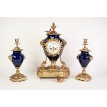 REPRODUCTION GILT METAL AND BLUE GLAZED PORCELAIN THREE PIECE CLOCK GARNITURE, the clock with 4"