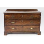 LATE EIGHTEENTH CENTURY FIGURED MAHOGANY CHEST OF DRAWERS OF WIDE PROPORTIONS, the moulded oblong