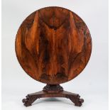 WILLIAM IV CARVED ROSEWOOD BREAKFAST TABLE, the circular tilt top wih nulled border and moulded