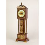 EARLY TWENTIETH CENTURY BRASS MOUNTED OAK MINIATURE LONGCASE CLOCK, the 3 ½" Arabic dial with