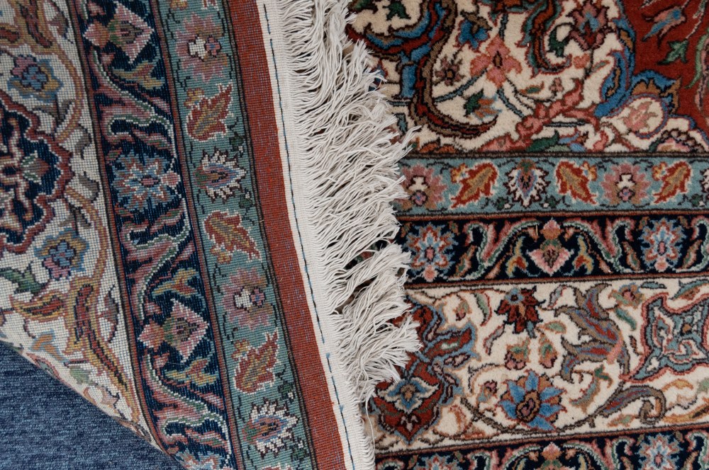 ROMANIAN HAND-MADE WOOL PILE CARPET OF PERSIAN DESIGN, heavy quality with intricate large circular - Image 3 of 3