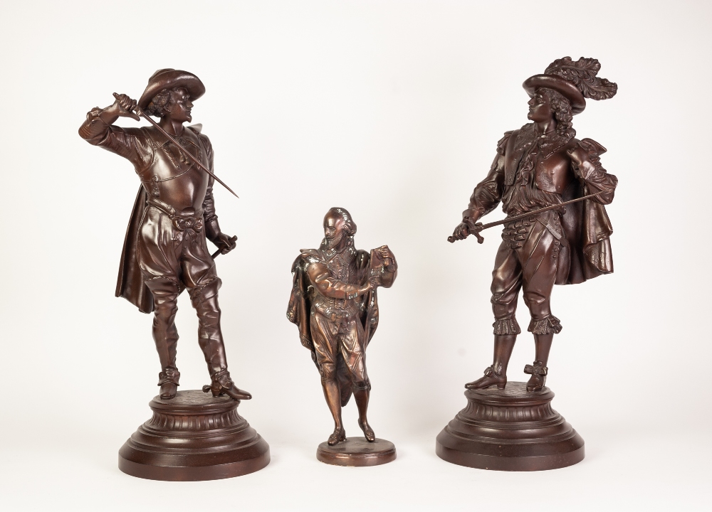 PAIR OF MODERN REPRODUCTION CAST METAL FIGURES OF MUSKATEERS, mid brown patination, each modelled