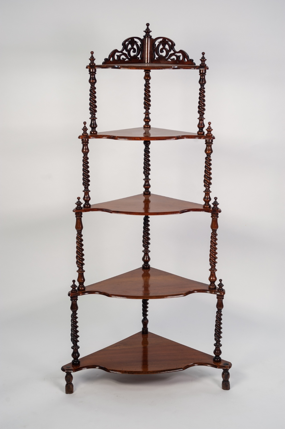 VICTORIAN CARVED WALNUT FIVE TIER CORNER WHAT-NOT, the graduating tiers with shaped front edges,