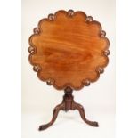 A FINE GEORGE III MAHOGANY TRIPOD TEA TABLE, the revolving and tilting 'birdcage' one piece top