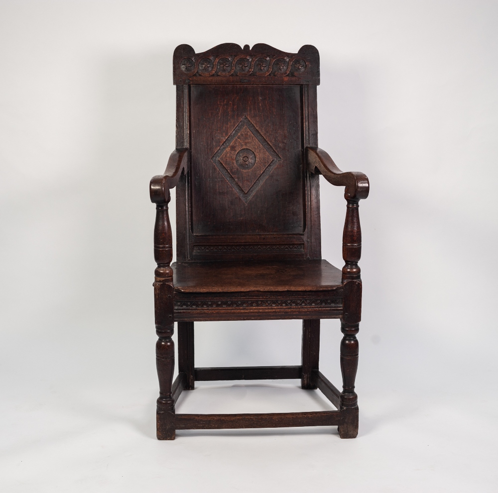 LATE SEVENTEENTH CENTURY CARVED OAK WAINSCOT CHAIR, the back with central diamond motif and