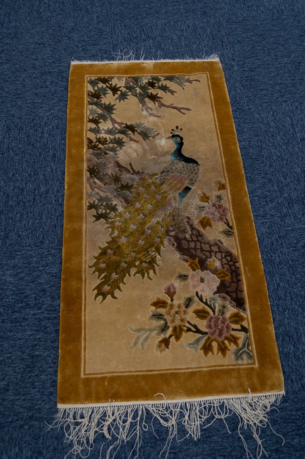 WASHED CHINESE SILKY PILE EMBOSSED PICTORIAL RUG depicting a peacock in a tree, fawn background, - Image 2 of 3