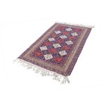 PERSIAN HAND WOVEN KELIM with an all-over diamond pattern in red, black and white, each with