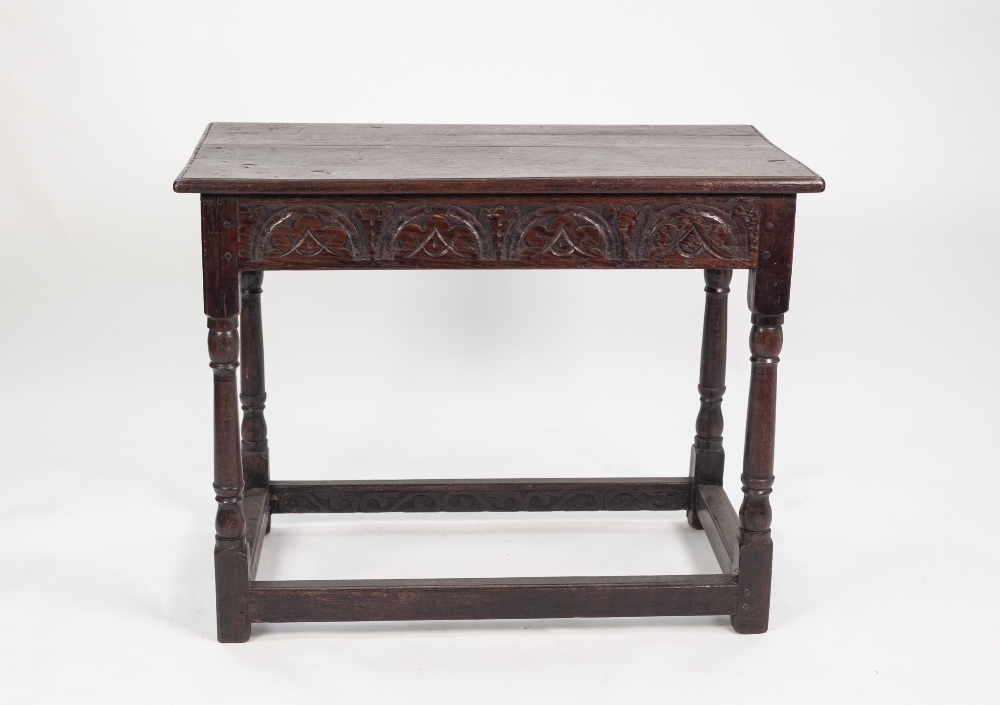 17th CENTURY STYLE OAK SIDE TABLE, the plank top with moulded edge above a front carved frieze, - Image 2 of 2