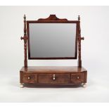 A GEORGE IV MAHOGANY TOILET MIRROR, crossbanded and strung with boxwood, fitted with three small