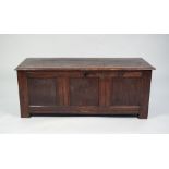 LATE SEVENTEENTH CENTURY OAK COFFER, of typical form with plank top and three panels to the front,