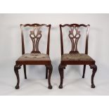 PAIR OF CHIPPENDALE STYLE AND PERIOD CARVED MAHOGANY SINGLE DINING CHAIRS, each with interlaced