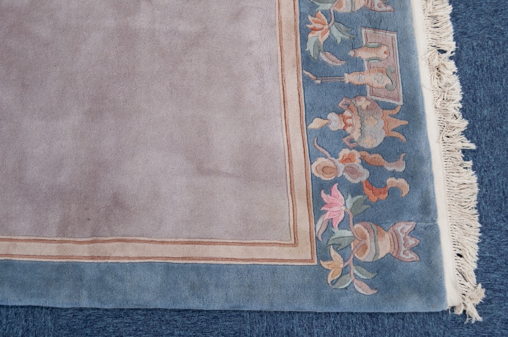 WASHED CHINESE SMALL CARPET with plain mushroom field, the pale green border having plain narrow - Image 2 of 3