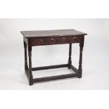 17th CENTURY STYLE OAK SIDE TABLE, the plank top with moulded edge above a front carved frieze,