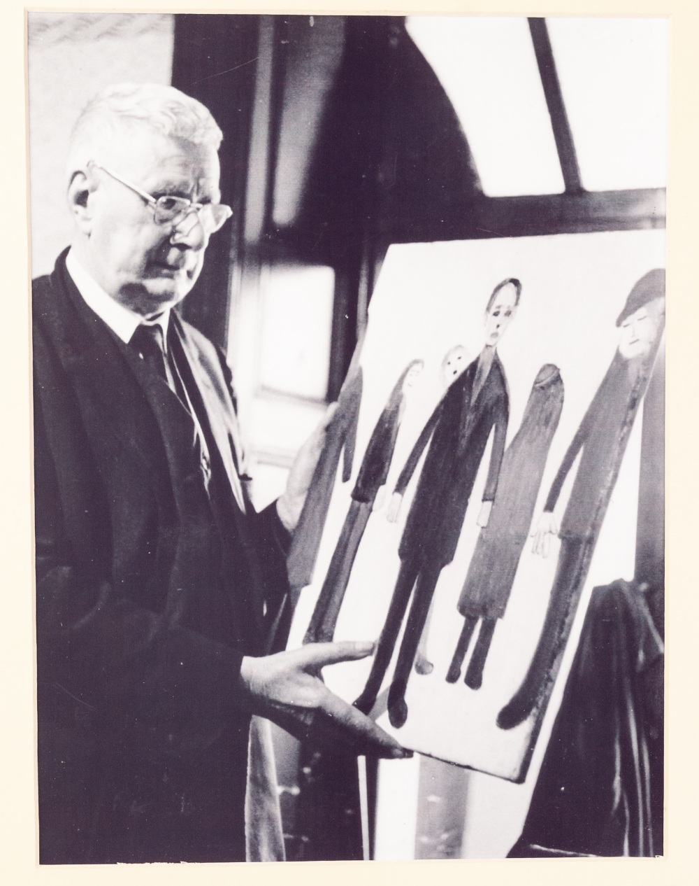 L.S. LOWRY BY MAURICE ROWE TEN BLACK AND WHITE PHOTOGRAPHS FEATURING LOWRY AND ONE OF SALFORD MARKET - Image 2 of 10