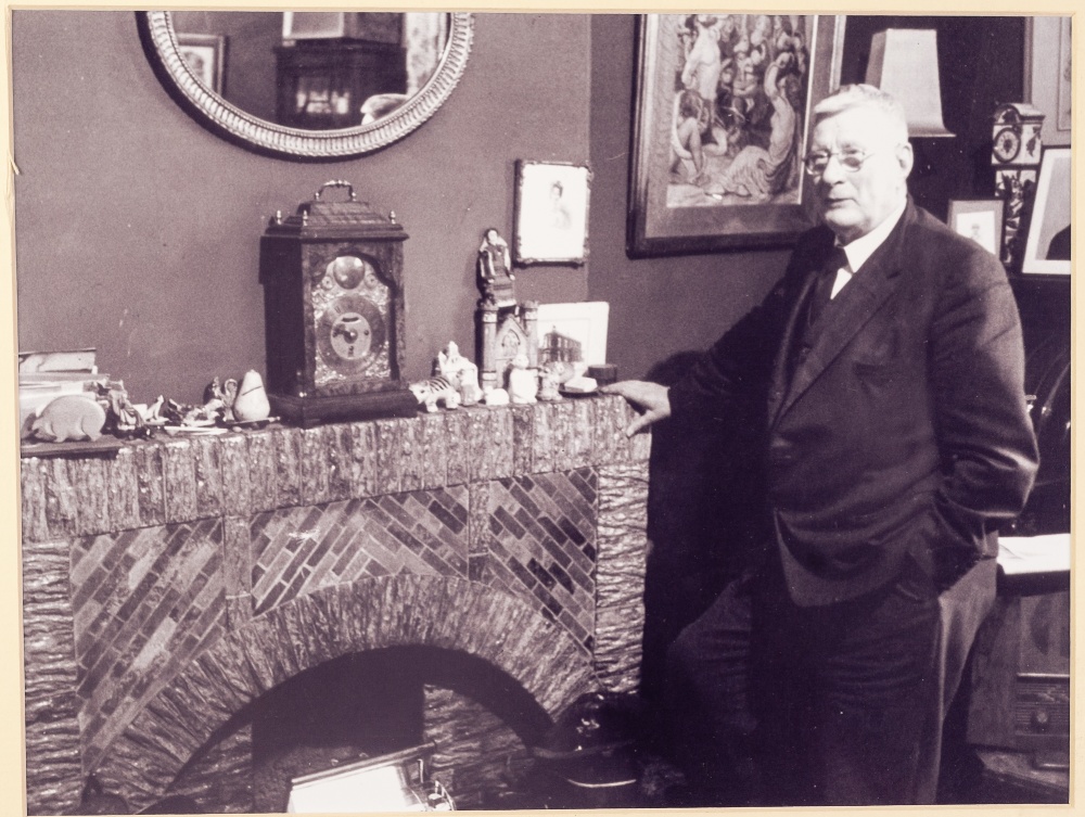 L.S. LOWRY BY MAURICE ROWE TEN BLACK AND WHITE PHOTOGRAPHS FEATURING LOWRY AND ONE OF SALFORD MARKET