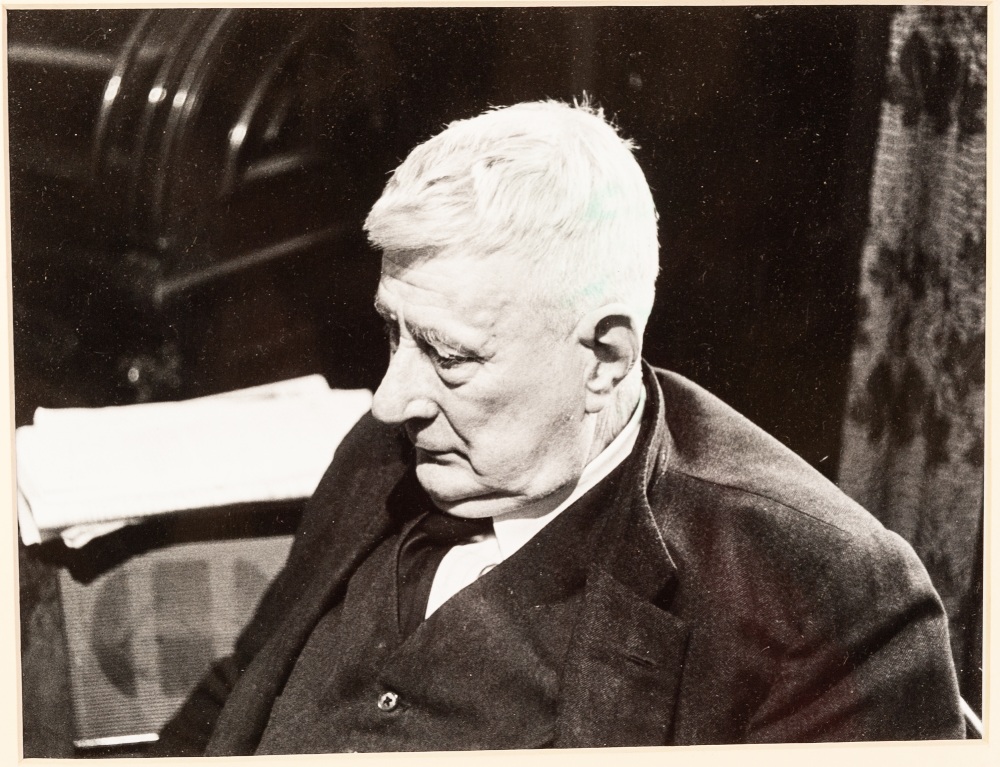 L.S. LOWRY BY MAURICE ROWE TEN BLACK AND WHITE PHOTOGRAPHS FEATURING LOWRY AND ONE OF SALFORD MARKET - Image 9 of 10