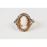 9ct GOLD RING set with an oval shell cameo carved with a female head, 3.3gms ring size 'O/P' and a