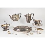 FOUR PIECE ELECTROPLATED TEA SERVICE BY JOHN ROUND & Co, of circular, panelled form with angular