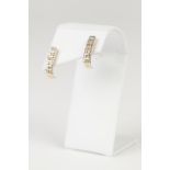 PAIR OF GOLD EARRINGS, with with a two row setting of 12 diamonds (2)