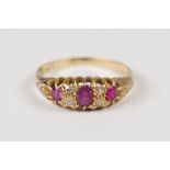 EARLY TWENTIETH CENTURY 18ct GOLD RING, set with a three rubies and two pairs of tiny diamonds, 2.