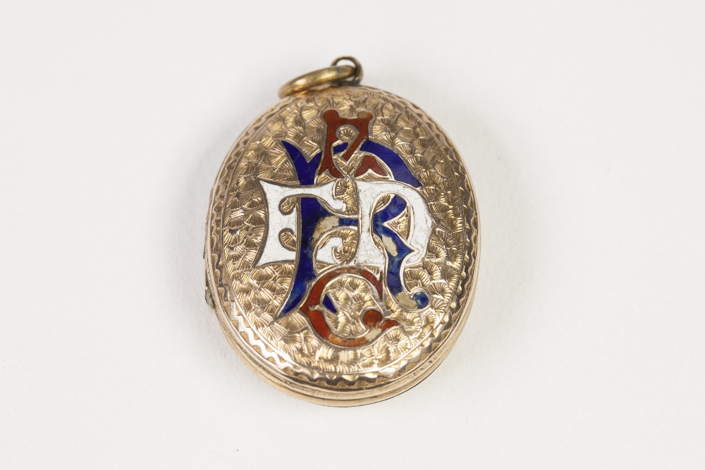 VICTORIAN CHASED OVAL LOCKET PENDANT, with gold back and front, the front, the front with