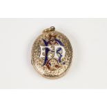 VICTORIAN CHASED OVAL LOCKET PENDANT, with gold back and front, the front, the front with