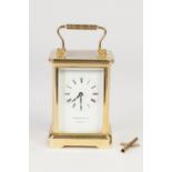 GARRARD AND CO., LONDON, TRADITIONAL CARRIAGE CLOCK with 11 jewel movement with white Roman dial, in