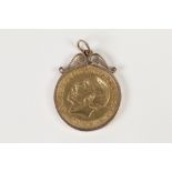 GEORGE V GOLD SOVEREIGN, in 9ct gold loose frame as a pendant, 9.3gms in total