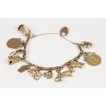 9ct GOLD CHARM BRACELET, with long box links, small 9ct gold padlock clasp and TWELVE GOLD CHARMS