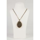 9ct GOLD CHAIN NECKLACE with flattened curb pattern links and the large 9ct GOLD OVAL LOCKET