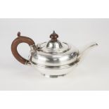 SILVER CIRCULAR TEA POT OF PLAIN SQUAT FORM WITH REEDED GIRDLE BROWN WOOD HANDLE AND FINIAL, 8 1/
