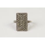 SILVER AND MARCASITE RING, with oblong cross set top