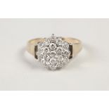 9ct GOLD CLUSTER RING set with nineteen small cubic zirconia, 4.8 gms