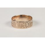 9ct GOLD BROAD WEDDING RING, with engraved pattern, 2.6 gms