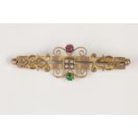 9ct GOLD TWIN BAR BROOCH set with seed pearls, green and red stones, 2" (5cm) wide