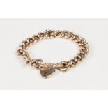 EDWARDIAN 9ct GOLD BRACELET, with hollow curb pattern links, and 9ct gold padlock clasp,