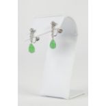 A PAIR OF 18ct WHITE GOLD, DIAMOND AND GREEN JADE EARRINGS, each having a small diamond over a