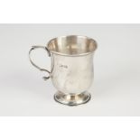 EDWARDIAN SILVER PEDESTAL CHRISTENING MUG of baluster form with double "C" scroll handle, 3" (7.6)