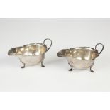 GEORGE V PAIR OF SILVER SAUCE BOATS BY MAPPIN & WEBB, of typical form with cyma borders, high scroll