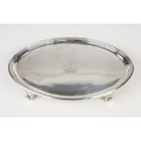 GEORGE III SILVER OVAL CARD TRAY, with cavetto border with reeded edge, on four tab feet, engraved