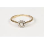 18ct GOLD RING, set with a daisy cluster of nine small diamonds, 2.2gms, ring size 'N/O'