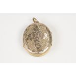 VICTORIAN ENGRAVED OVAL LOCKET PENDANT, with gold back and front, double opening with hinges on