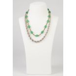 A GILT METAL AND GREEN HARDSTONE BEAD NECKLACE, TOGETHER WITH A 'Sterling' silver braided