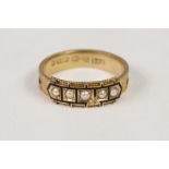 VICTORIAN 15ct GOLD AND BLACK ENAMELLED MEMORIAL RING, the top set with five seed pearls in black