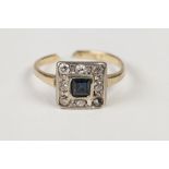 GOLD AND PLATINUM SQUARE CLUSTER RING, set with centre square sapphire and surround of seven small