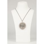 SILVER FINE CHAIN NECKLACE AND COIN PENDANT, in the form of a 1977 Crown coin in loose silver