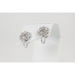 PAIR OF DIAMOND DAISY CLUSTER EARRINGS, each collet set with a centre round brilliant cut diamond,