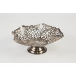 PIERCED SILVER PEDESTAL BON BON DISH, of wavy hexagonal form with spreading, moulded foot, decorated